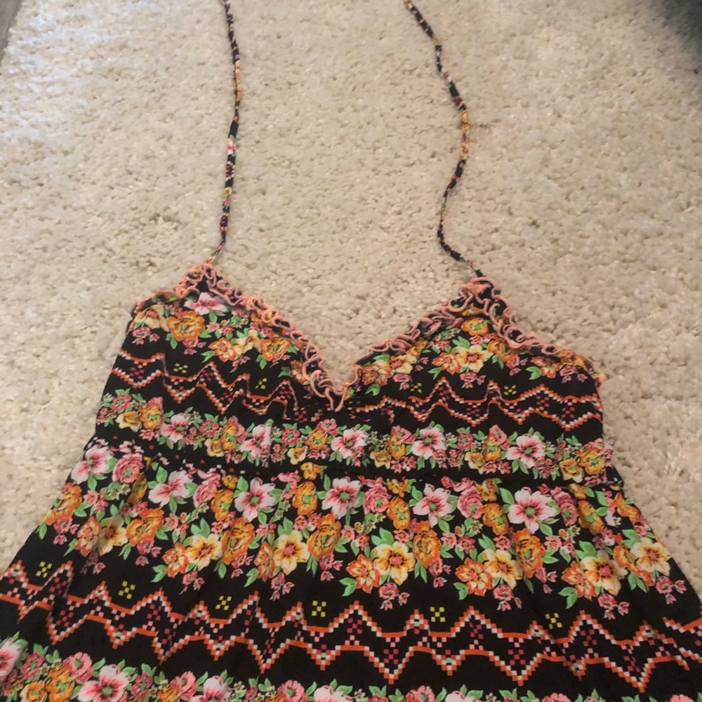 Luli Fama cover up and bikini bottoms